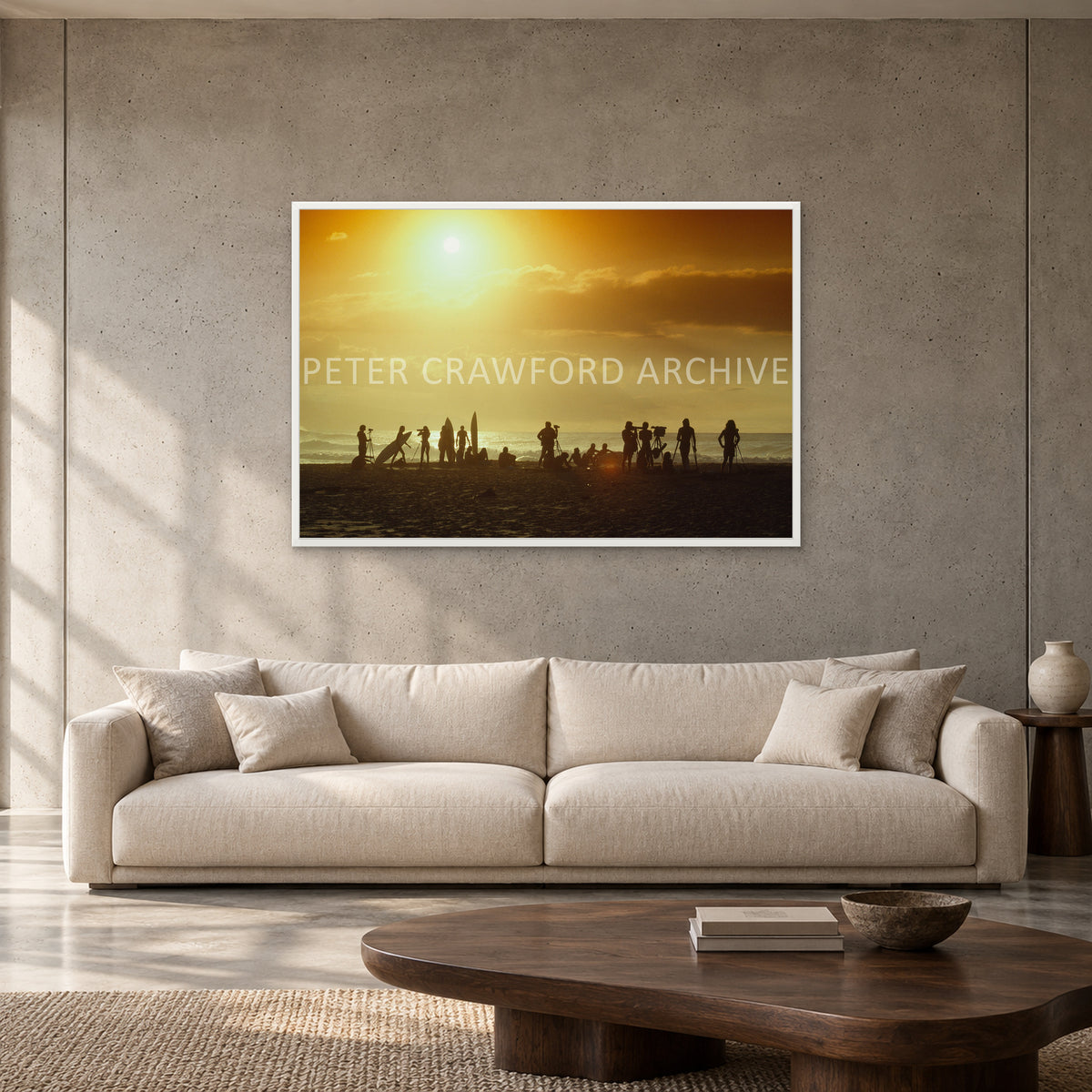 North Shore Sunset by Peter Crawford — 120 × 80 cm, white full frame, shown to scale in a contemporary concrete-wall living room.