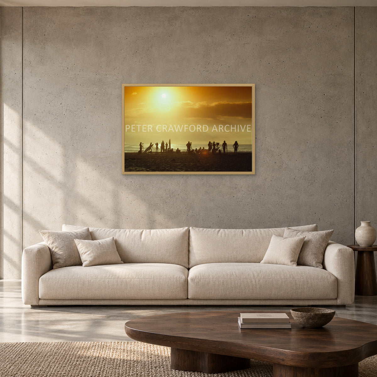 North Shore Sunset by Peter Crawford — 90 × 60 cm, hayseed full frame, shown to scale in a contemporary concrete-wall living room.
