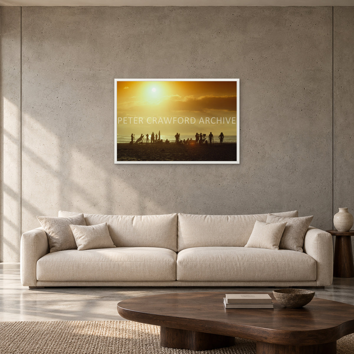 North Shore Sunset by Peter Crawford — 90 × 60 cm, white full frame, shown to scale in a contemporary concrete-wall living room.