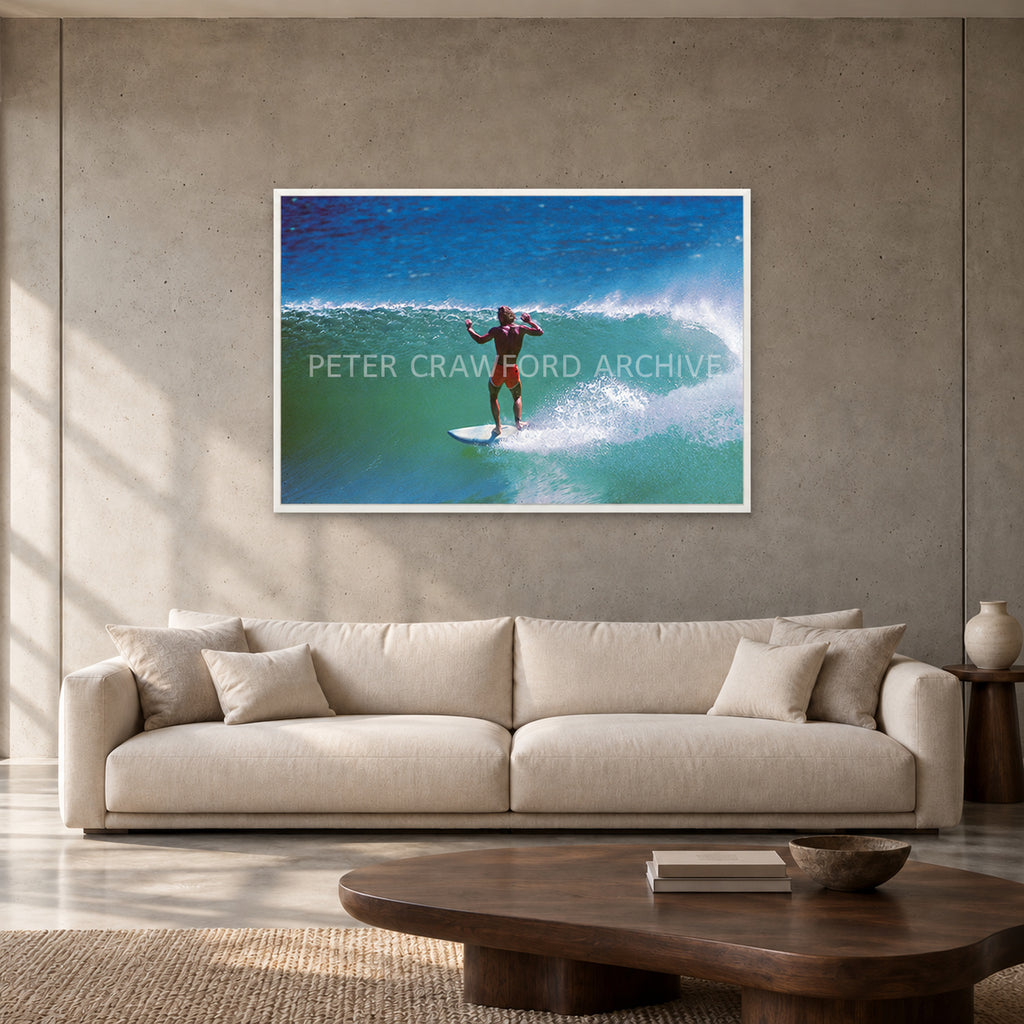 Terry Fitzgerald at Sunset Beach — 120 × 80 cm, white full frame, shown in a contemporary concrete-wall living room.