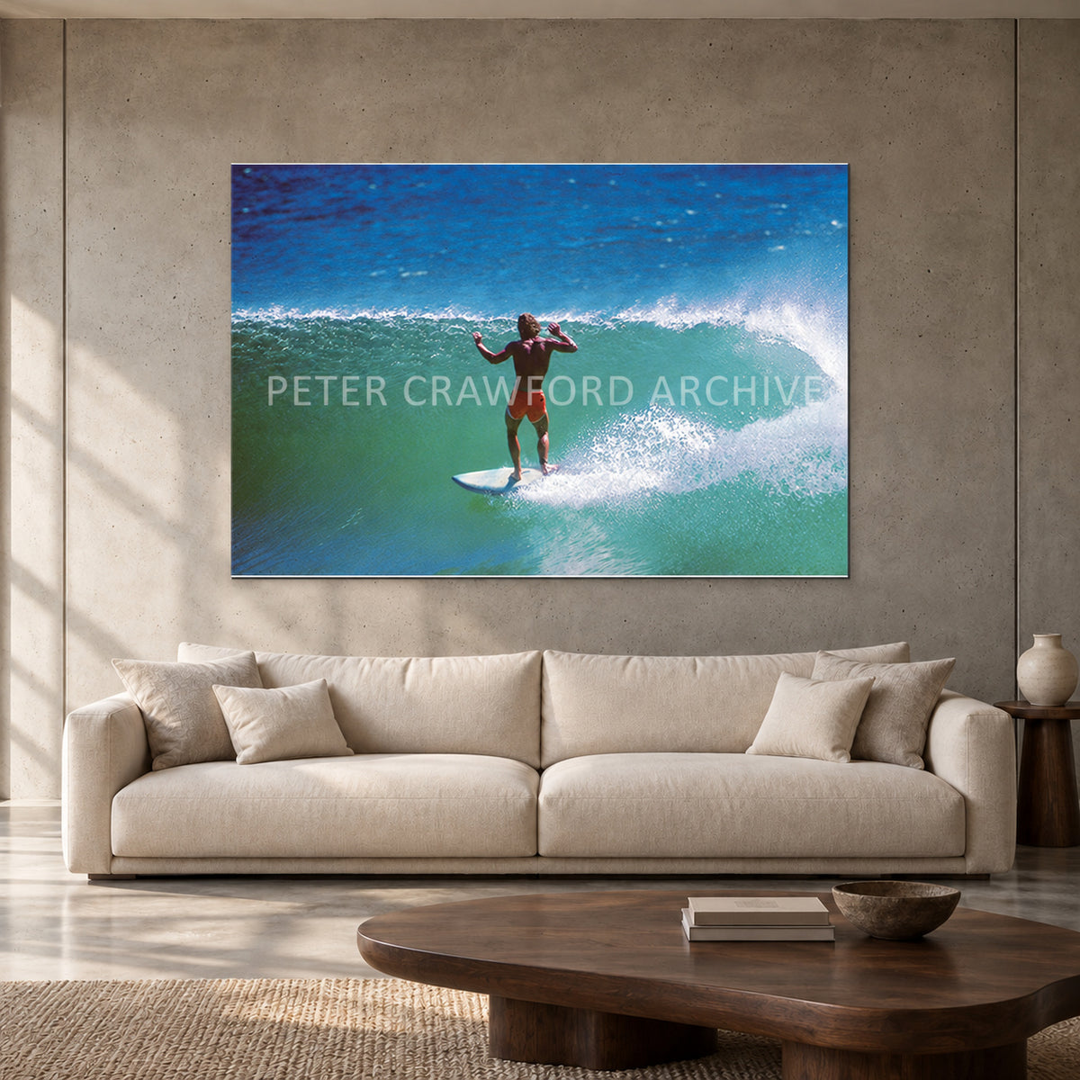 Terry Fitzgerald at Sunset Beach — 152 × 102 cm, aluminium resin mount, shown in a contemporary concrete-wall living room.
