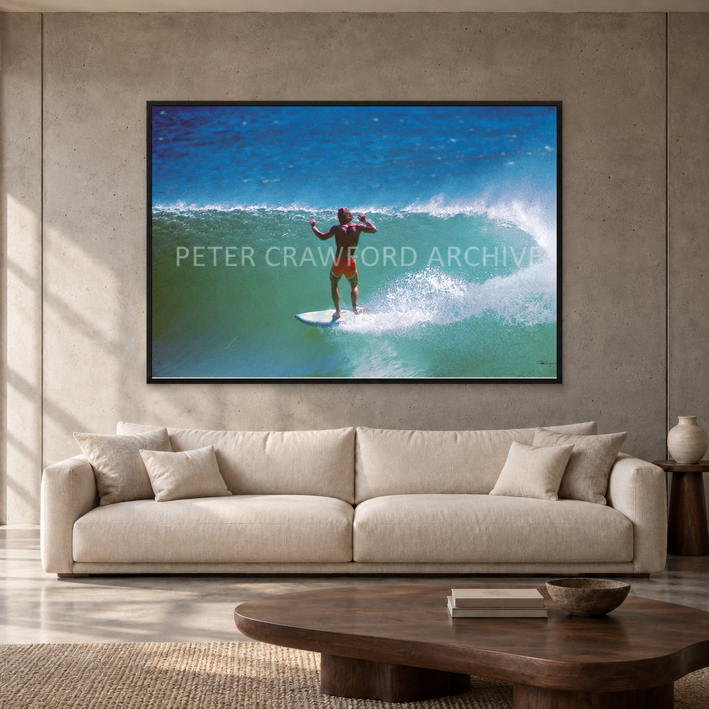 Terry Fitzgerald at Sunset Beach — 152 × 102 cm, black full frame, shown in a contemporary concrete-wall living room.