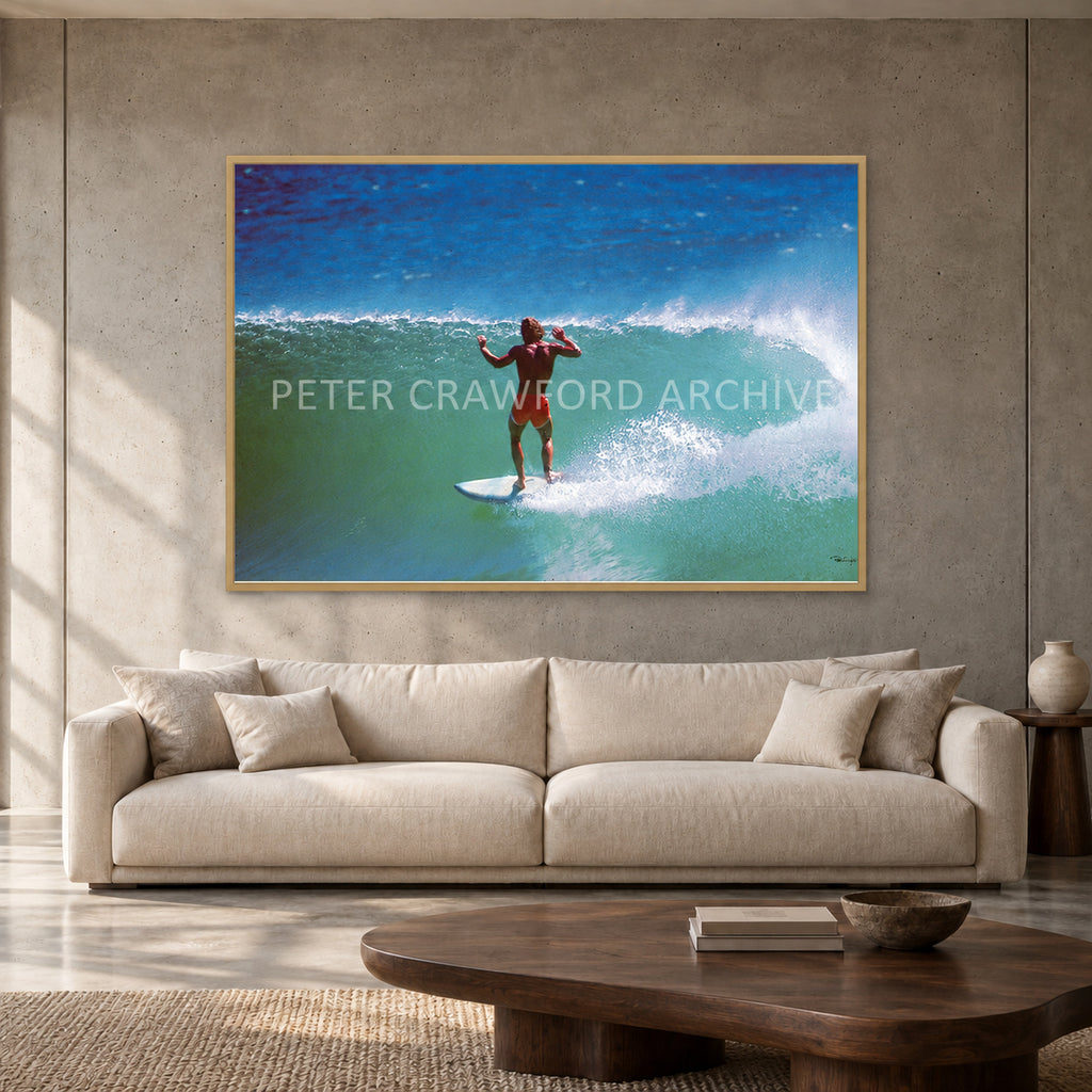 Terry Fitzgerald at Sunset Beach — 152 × 102 cm, hayseed full frame, shown in a contemporary concrete-wall living room.