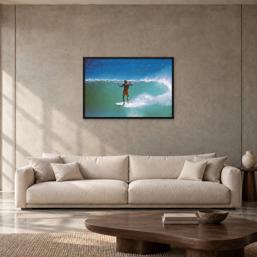 Terry Fitzgerald at Sunset Beach — 90 × 60 cm, black full frame, shown in a contemporary concrete-wall living room.