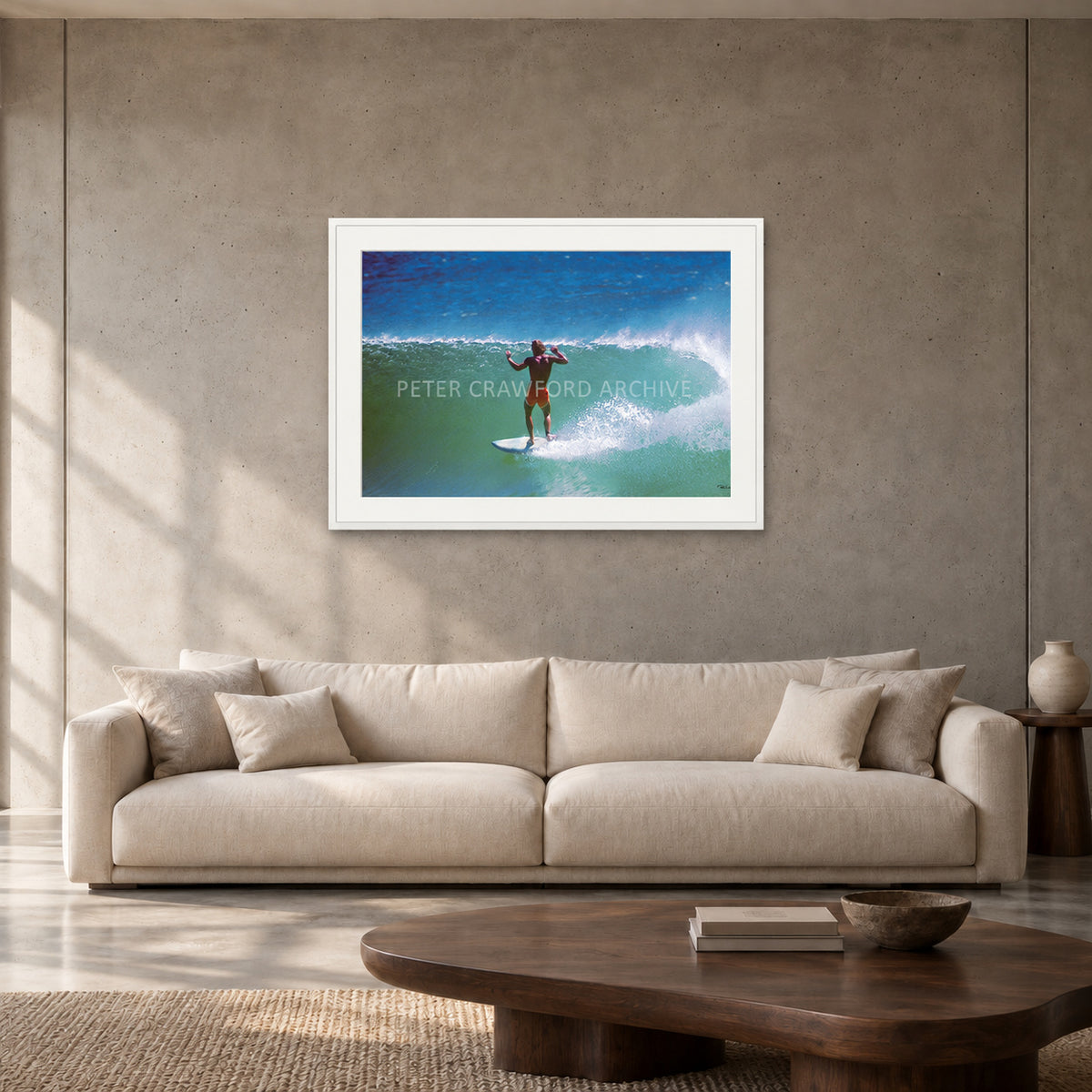 Terry Fitzgerald at Sunset Beach — 90 × 60 cm, white frame with mat, shown in a contemporary concrete-wall living room.