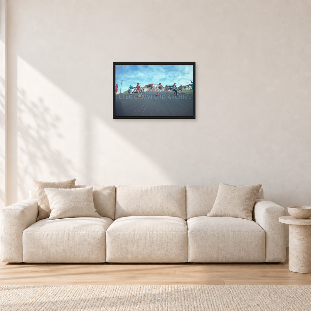 Skate Rock n Roll DY 1977 by Peter Crawford — 60 × 40 cm, black frame, shown in a light minimalist living room.