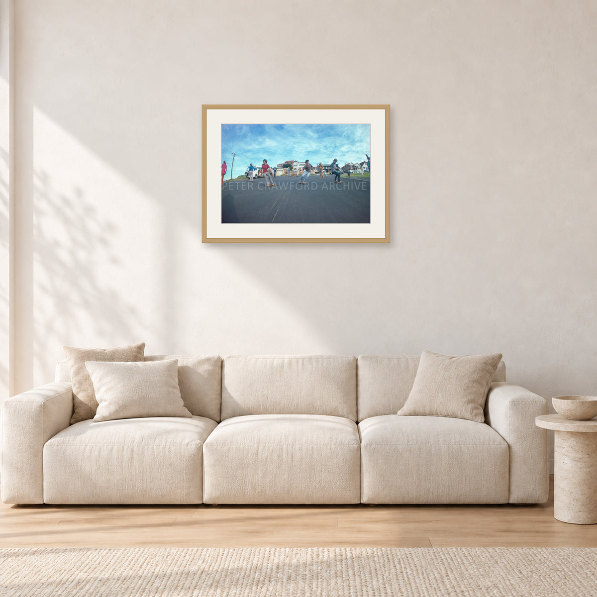 Skate Rock n Roll DY 1977 by Peter Crawford — 60 × 40 cm, hayseed frame with white mat, shown in a light minimalist living room.