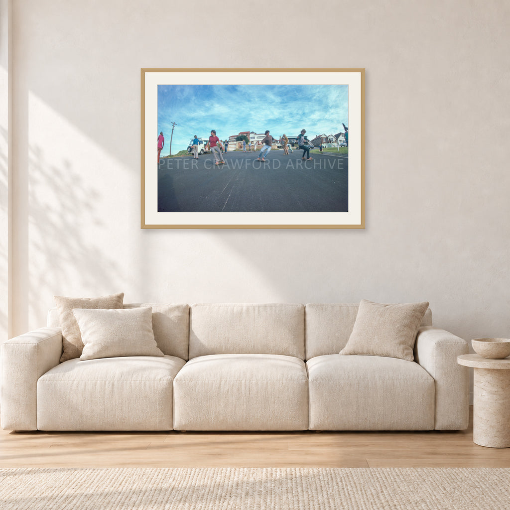 Skate Rock n Roll DY 1977 by Peter Crawford — 90 × 60 cm, hayseed frame with white mat, shown in a light minimalist living room.