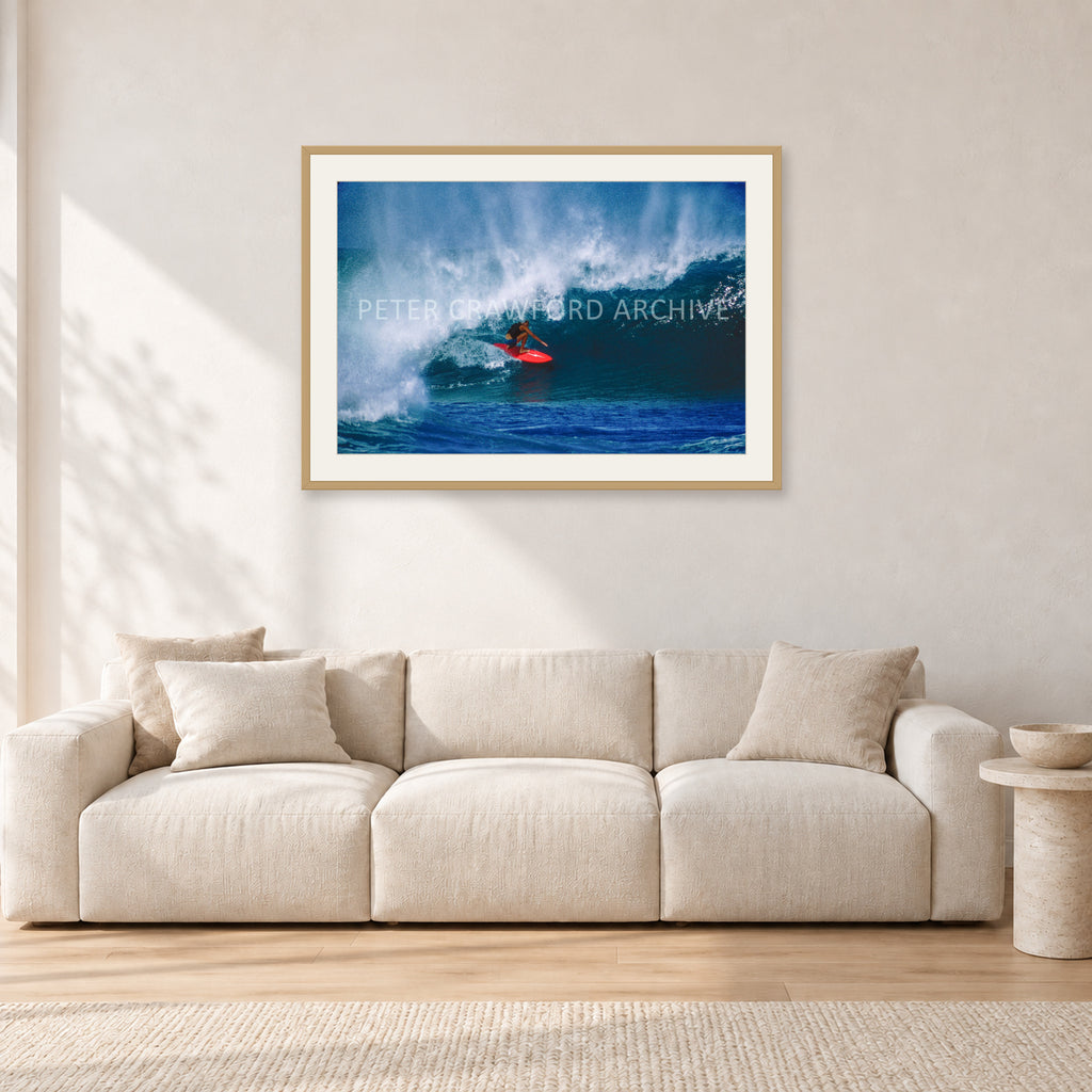 Rory Russell, Pipeline 1978 by Peter Crawford — 90 × 60 cm, hayseed frame with white mat, shown in a light minimalist living room.