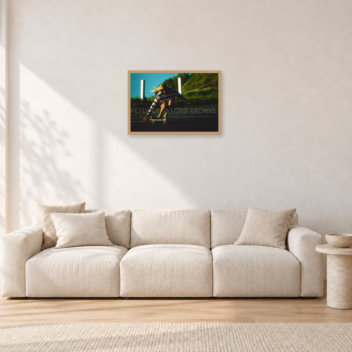 Russel Lewis Skate DY by Peter Crawford — 60 × 40 cm, hayseed frame, shown in a light minimalist living room.
