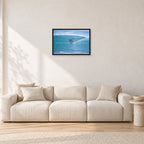 Russell L, Surf Study by Peter Crawford — 60 × 40 cm, black frame, shown in a light minimalist living room.