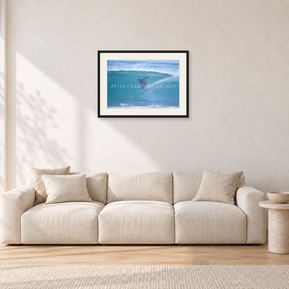 Russell L, Surf Study by Peter Crawford — 60 × 40 cm, black frame with white mat, shown in a light minimalist living room.