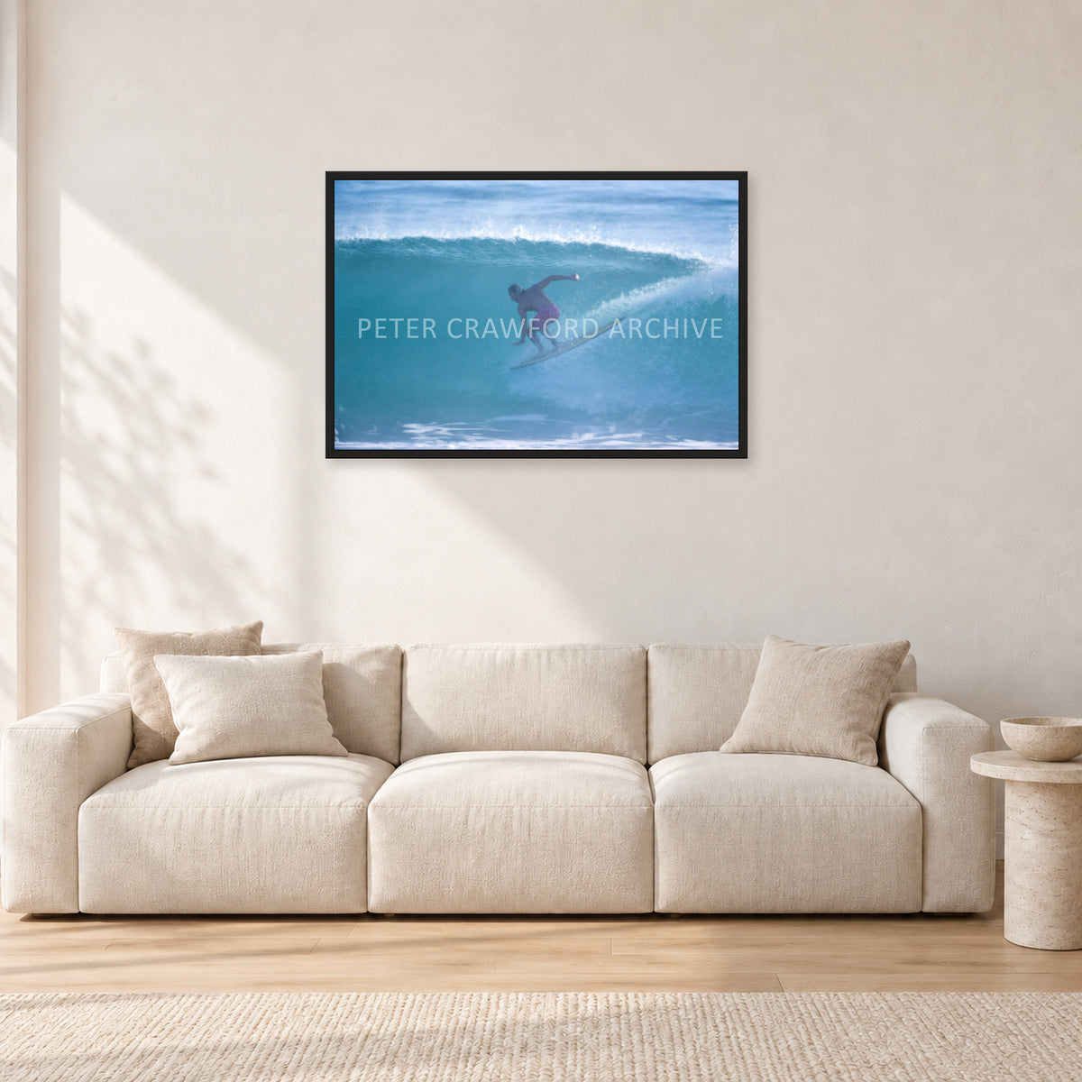 Russell L, Surf Study by Peter Crawford — 90 × 60 cm, black frame, shown in a light minimalist living room.