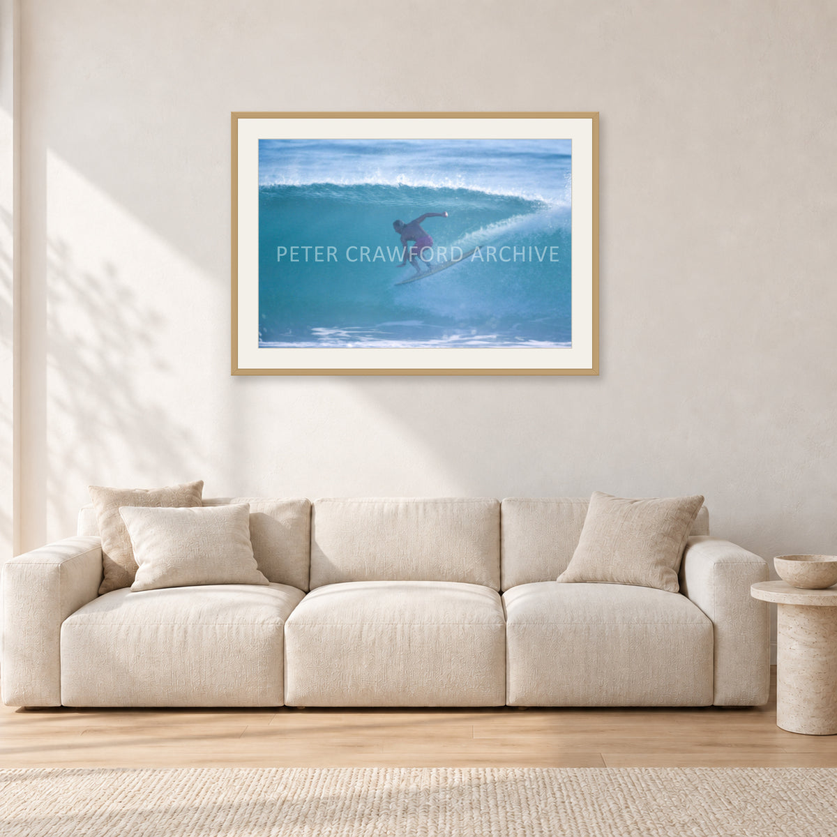 Russell L, Surf Study by Peter Crawford — 90 × 60 cm, hayseed frame with white mat, shown in a light minimalist living room.
