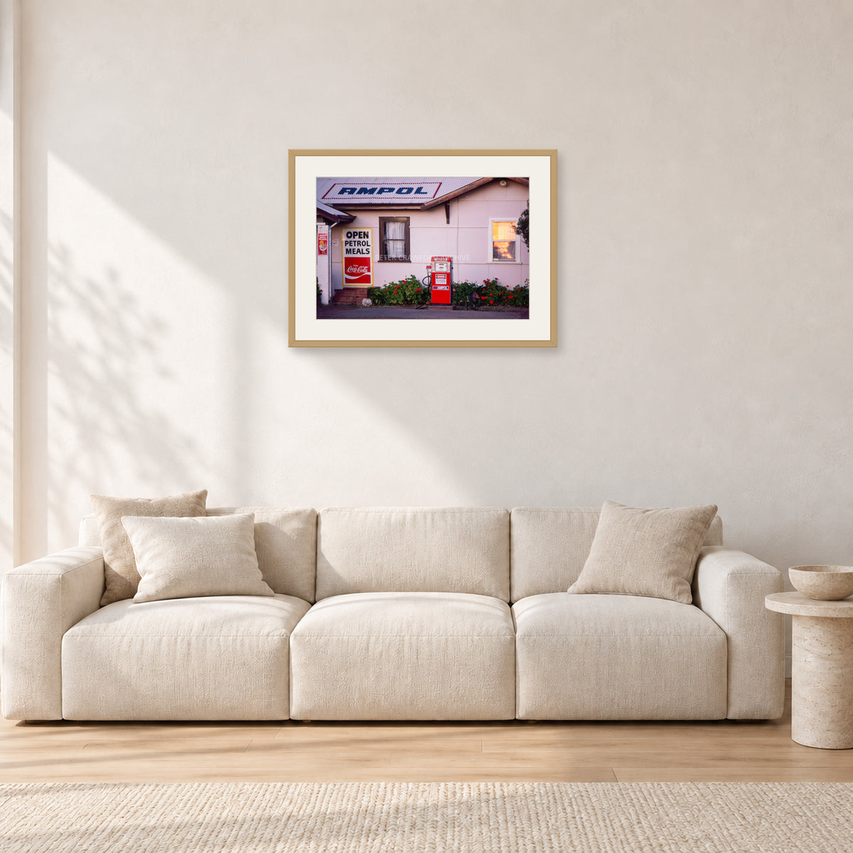 Seventies Petrol Station, 1970 by Peter Crawford — 60 × 40 cm, hayseed frame with white mat, shown in a light minimalist living room.