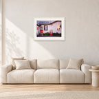 Seventies Petrol Station, 1970 by Peter Crawford — 60 × 40 cm, white frame with white mat, shown in a light minimalist living room.