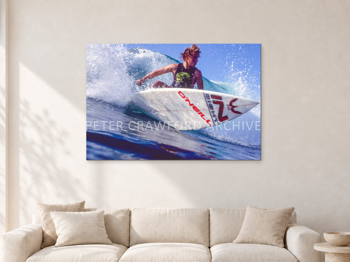 Shane Herring, Dee Why Point 1989 by Peter Crawford — 120 × 80 cm, aluminium-mounted resin print, shown in a light minimalist living room.