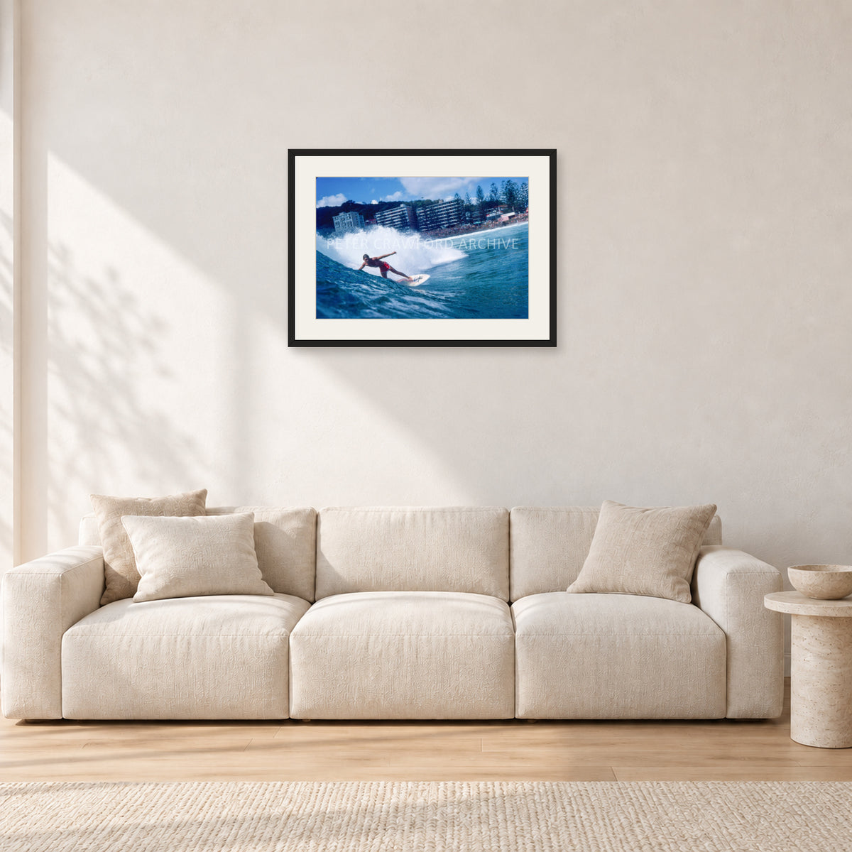 Shaun, Stubbies 1977 by Peter Crawford — 60 × 40 cm, black frame with white mat, shown in a light minimalist living room.