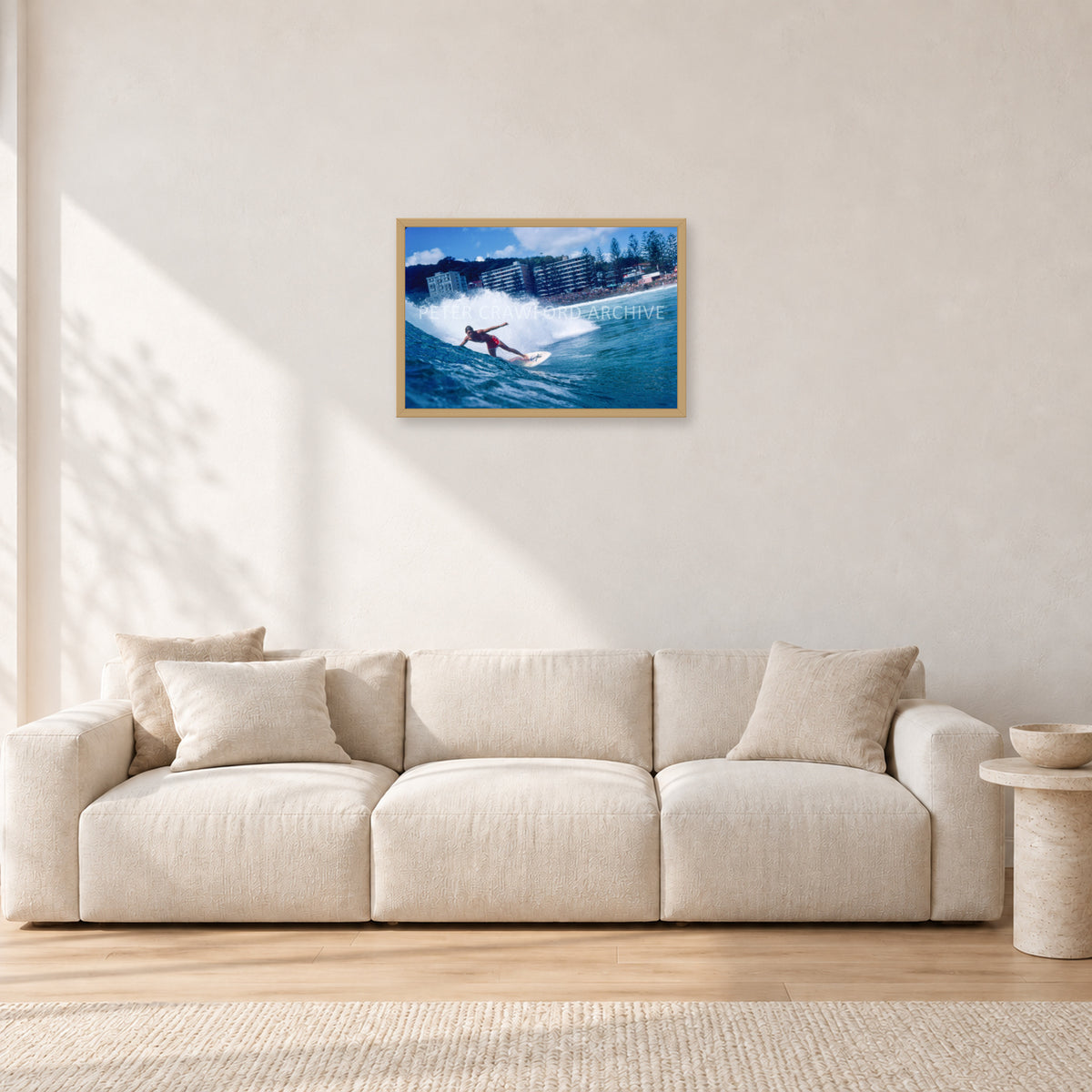 Shaun, Stubbies 1977 by Peter Crawford — 60 × 40 cm, hayseed frame, shown in a light minimalist living room.