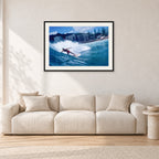 Shaun, Stubbies 1977 by Peter Crawford — 90 × 60 cm, black frame with white mat, shown in a light minimalist living room.