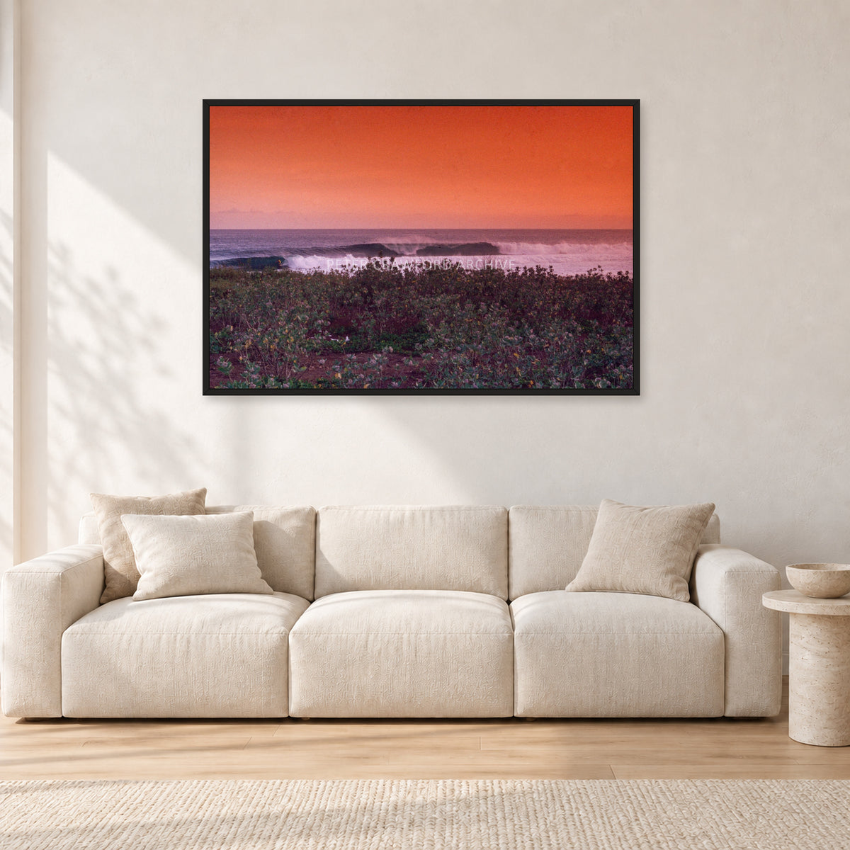 Sumbawa, Indonesia by Peter Crawford — 120 × 80 cm, black frame, shown in a light minimalist living room.