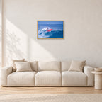 Sunset Beach, Hawaii by Peter Crawford — 60 × 40 cm, hayseed frame, shown in a light minimalist living room.