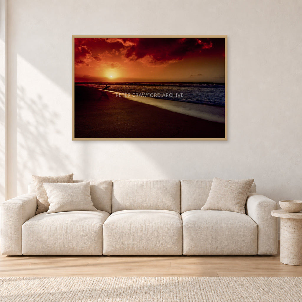 Sunset Favourite by Peter Crawford — 120 × 80 cm, hayseed frame, shown in a light minimalist living room.