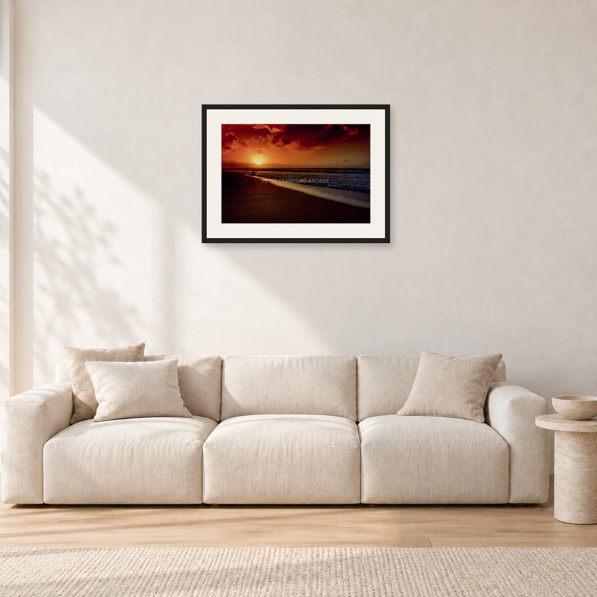Sunset Favourite by Peter Crawford — 60 × 40 cm, black frame with white mat, shown in a light minimalist living room.
