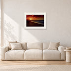Sunset Favourite by Peter Crawford — 60 × 40 cm, white frame with white mat, shown in a light minimalist living room.