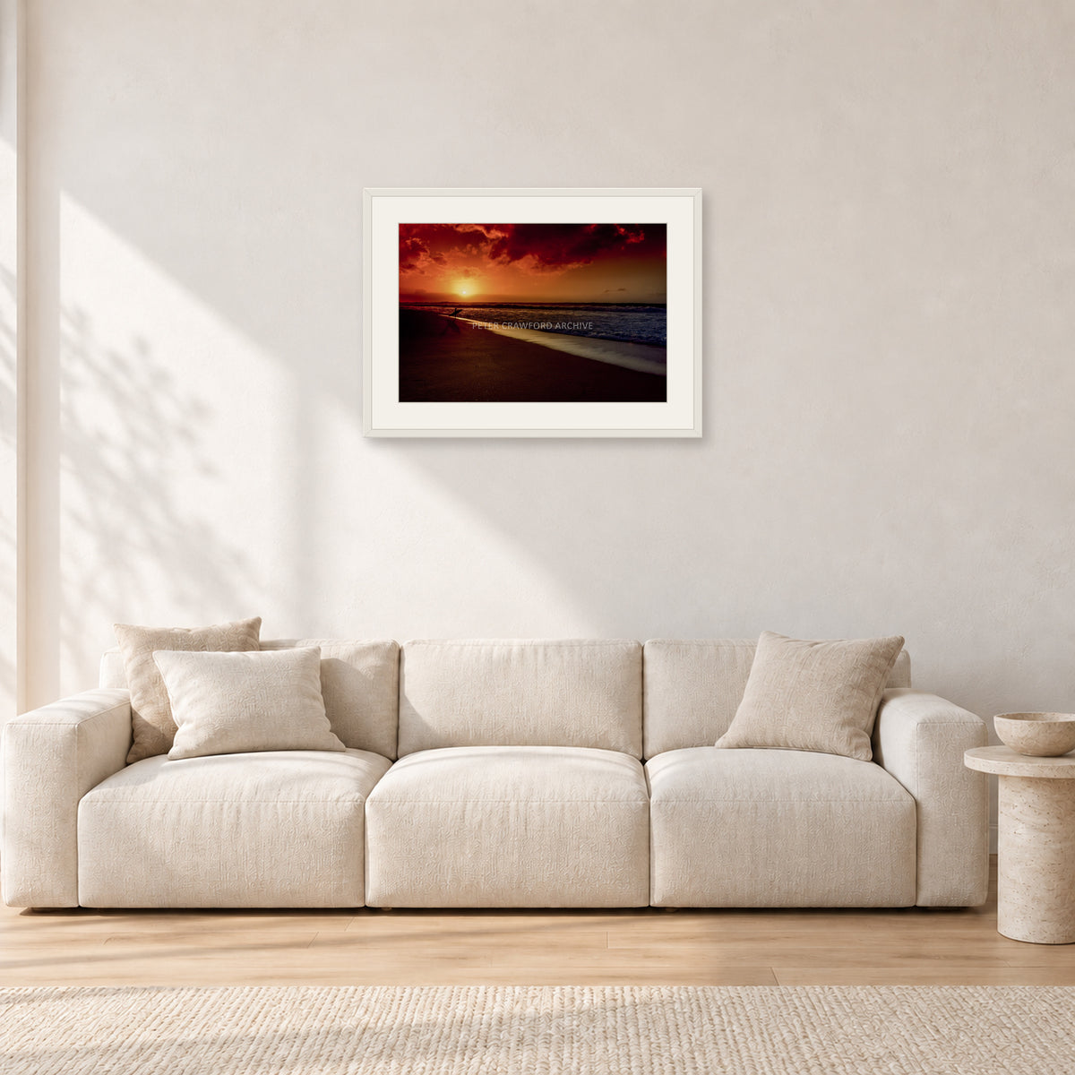 Sunset Favourite by Peter Crawford — 60 × 40 cm, white frame with white mat, shown in a light minimalist living room.