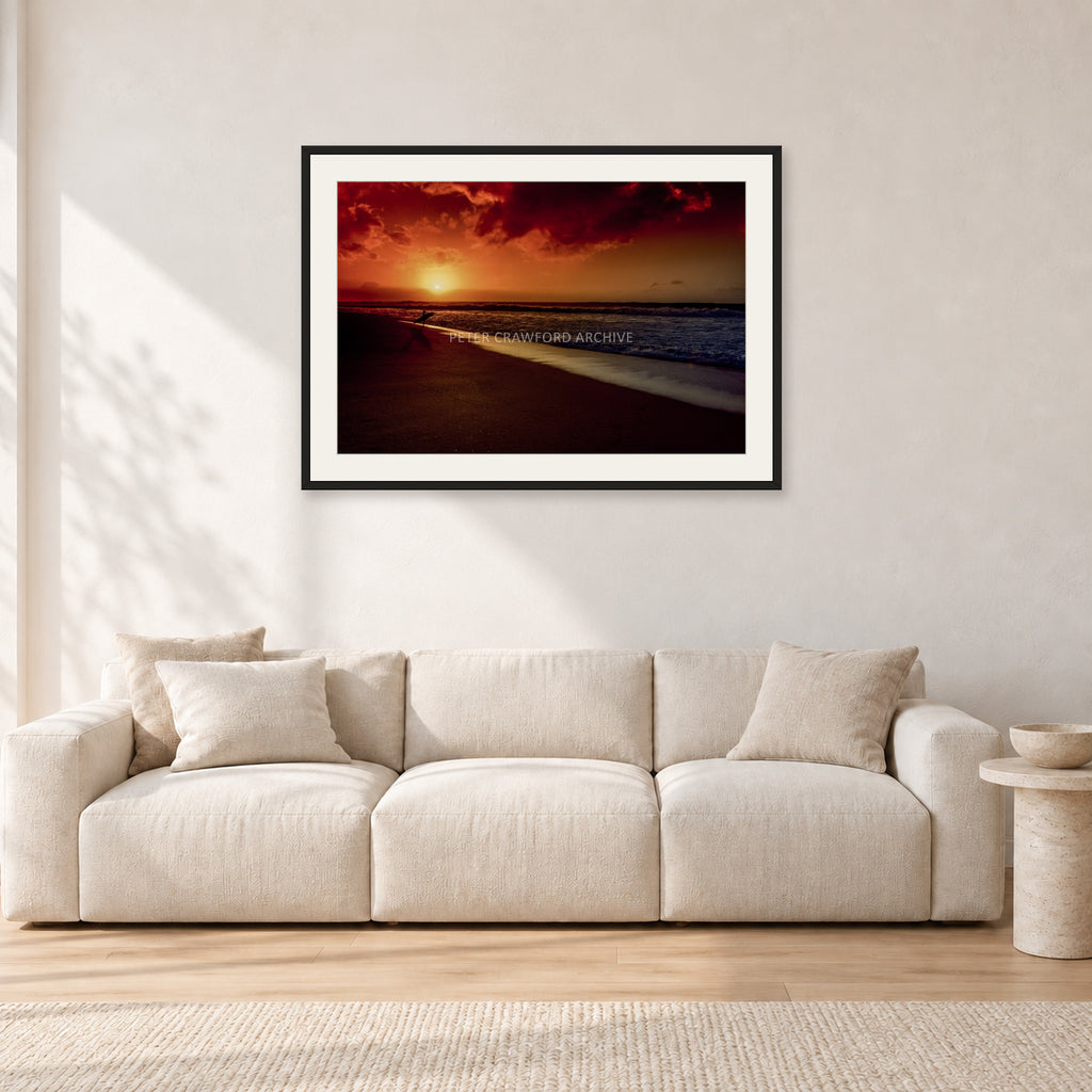Sunset Favourite by Peter Crawford — 90 × 60 cm, black frame with white mat, shown in a light minimalist living room.
