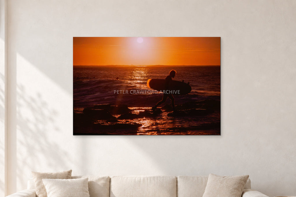 Sunset X1 by Peter Crawford — 120 × 80 cm, aluminium-mounted resin print, shown in a light minimalist living room.