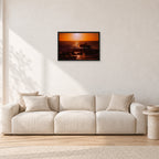 Sunset X1 by Peter Crawford — 60 × 40 cm, black frame, shown in a light minimalist living room.