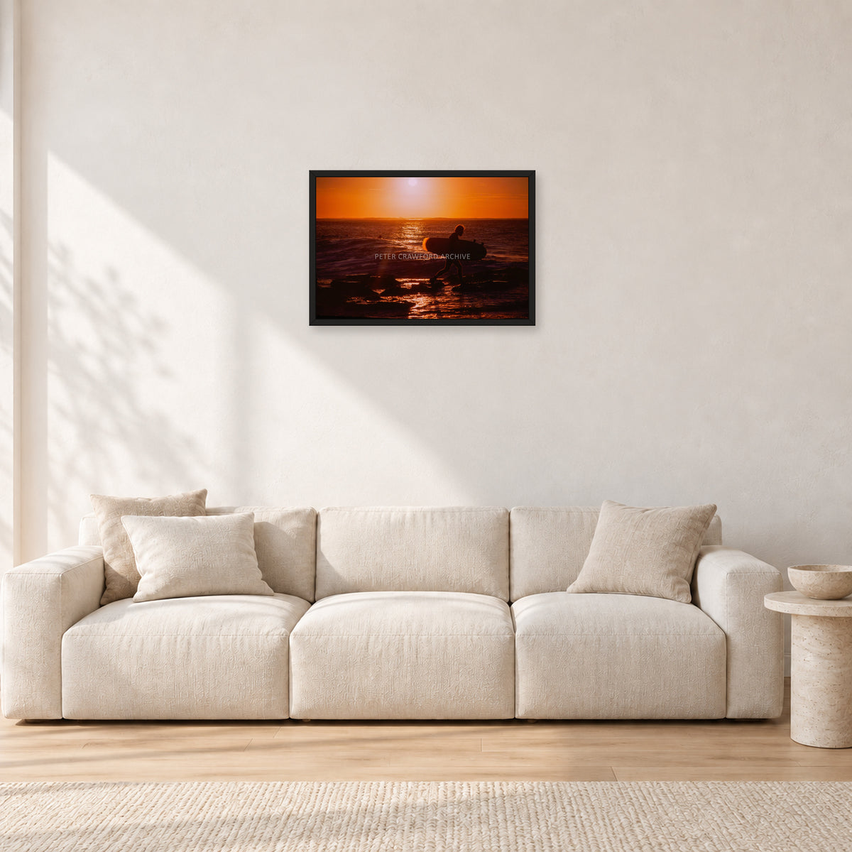 Sunset X1 by Peter Crawford — 60 × 40 cm, black frame, shown in a light minimalist living room.