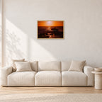 Sunset X1 by Peter Crawford — 60 × 40 cm, hayseed frame, shown in a light minimalist living room.