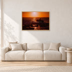 Sunset X1 by Peter Crawford — 90 × 60 cm, hayseed frame, shown in a light minimalist living room.