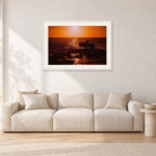Sunset X1 by Peter Crawford — 90 × 60 cm, white frame with white mat, shown in a light minimalist living room.
