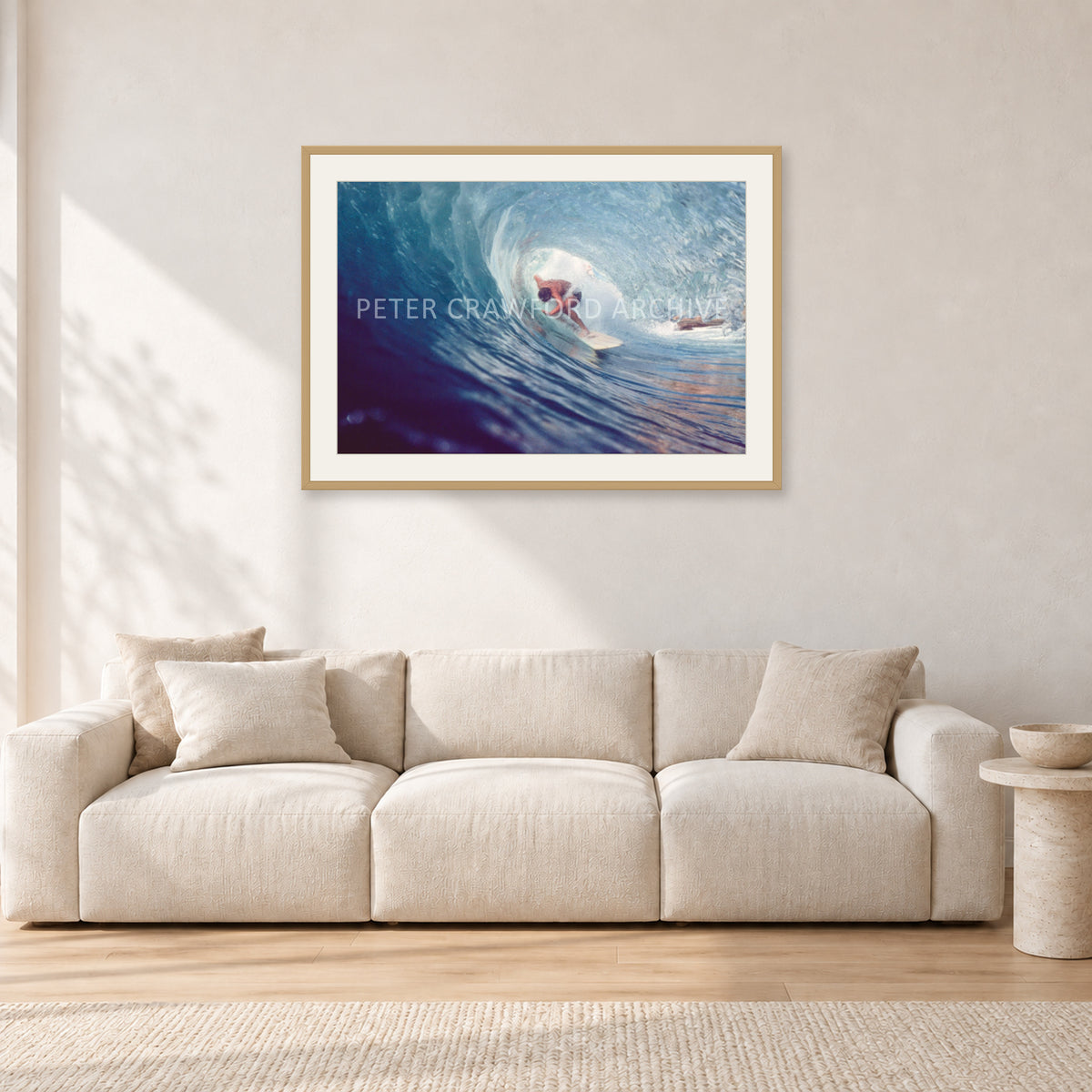 Surf Study 33 by Peter Crawford — 90 × 60 cm, hayseed frame with white mat, shown in a light minimalist living room.