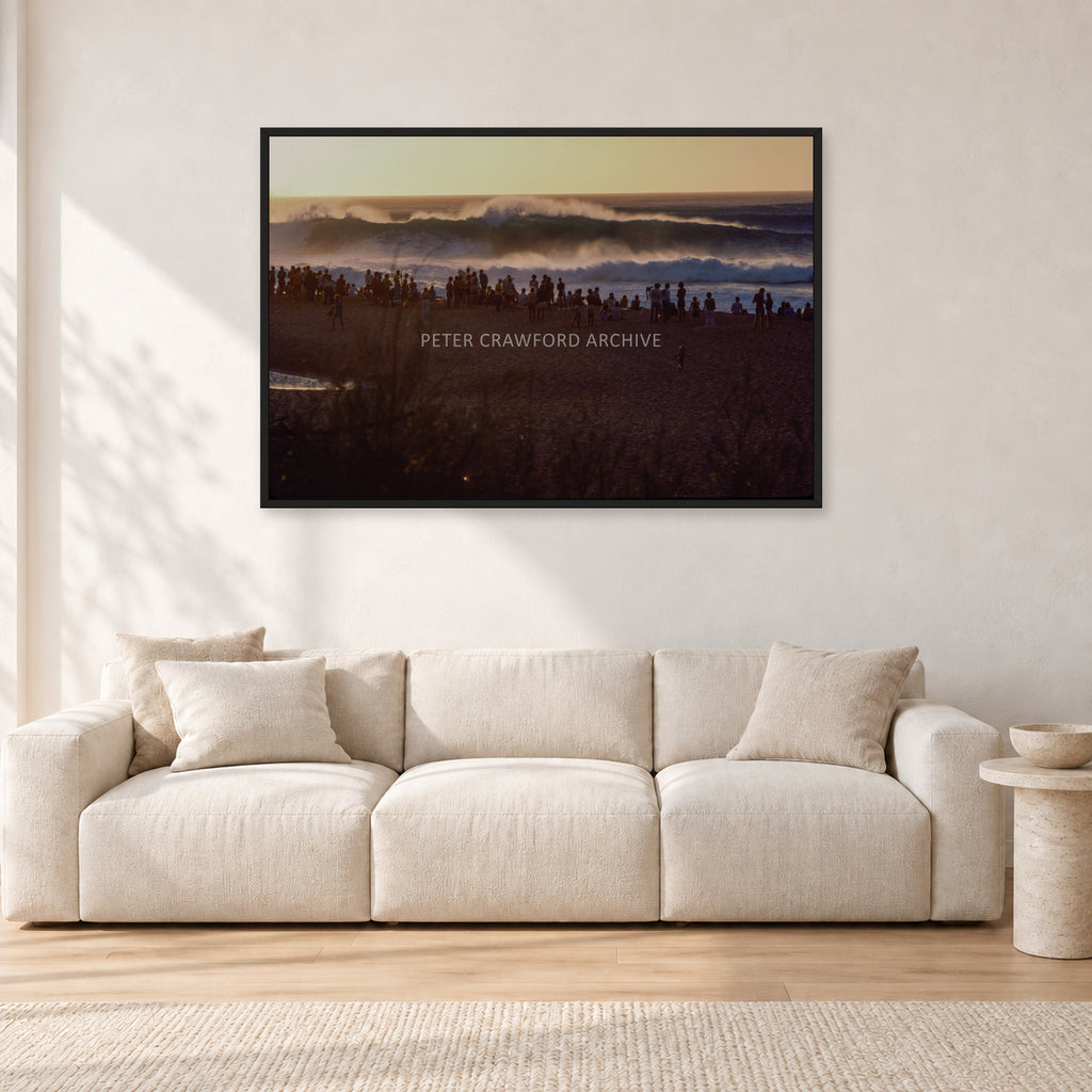 The Big Show, Pipeline 1975 by Peter Crawford — 120 × 80 cm, black frame, shown in a light minimalist living room.