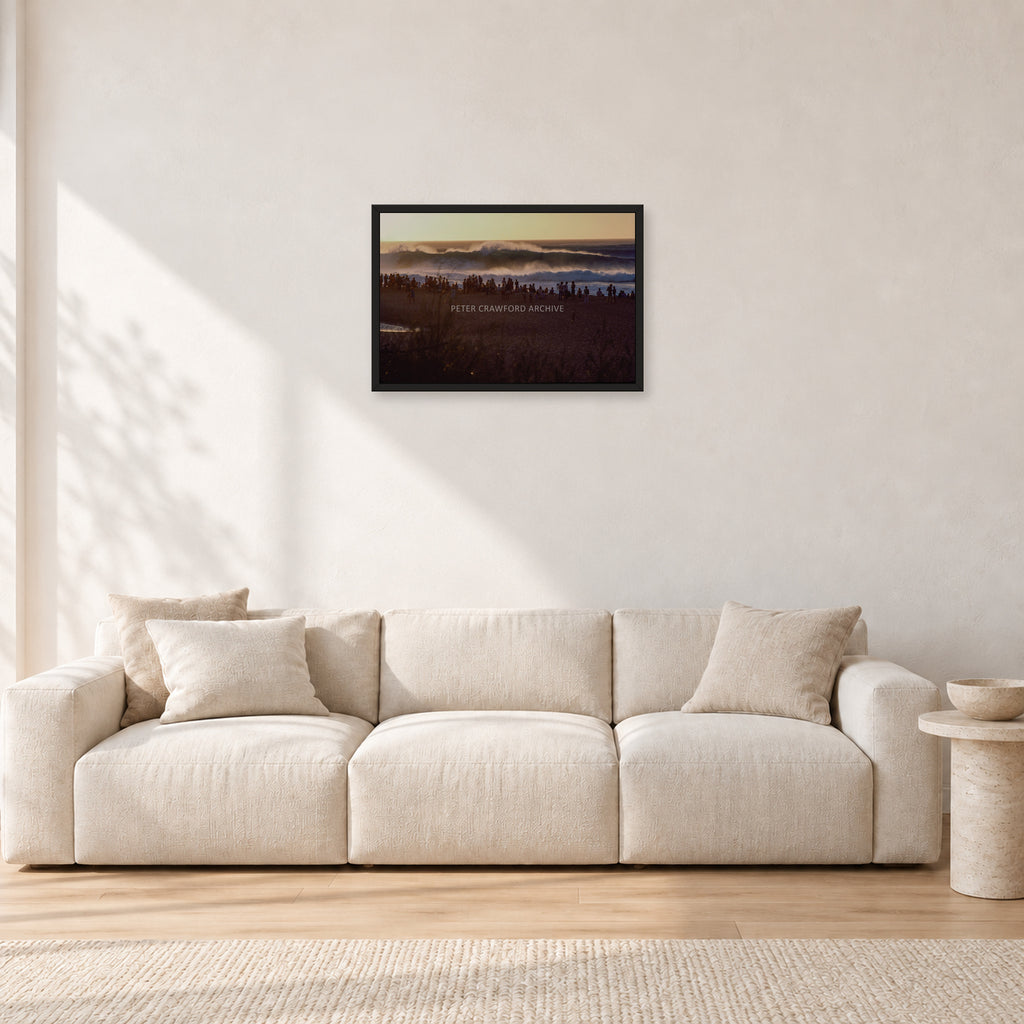 The Big Show, Pipeline 1975 by Peter Crawford — 60 × 40 cm, black frame, shown in a light minimalist living room.