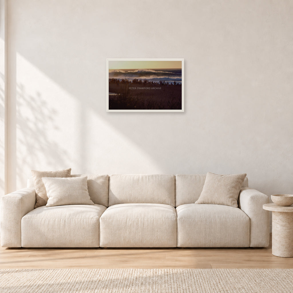 The Big Show, Pipeline 1975 by Peter Crawford — 60 × 40 cm, white frame, shown in a light minimalist living room.