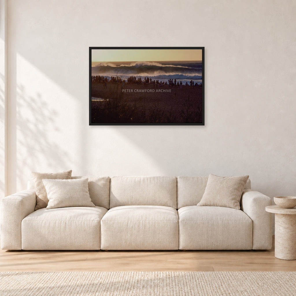 The Big Show, Pipeline 1975 by Peter Crawford — 90 × 60 cm, black frame, shown in a light minimalist living room.