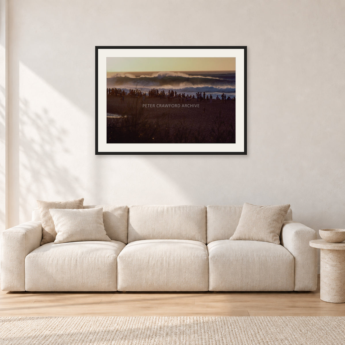 The Big Show, Pipeline 1975 by Peter Crawford — 90 × 60 cm, black frame with white mat, shown in a light minimalist living room.