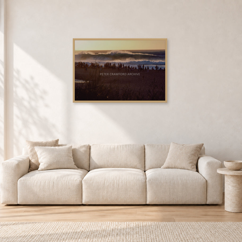 The Big Show, Pipeline 1975 by Peter Crawford — 90 × 60 cm, hayseed frame, shown in a light minimalist living room.