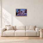 Tom Carroll, Mike Newling and Simon Anderson, Huntington 1984 by Peter Crawford — 60 × 40 cm, hayseed frame, shown in a light minimalist living room.