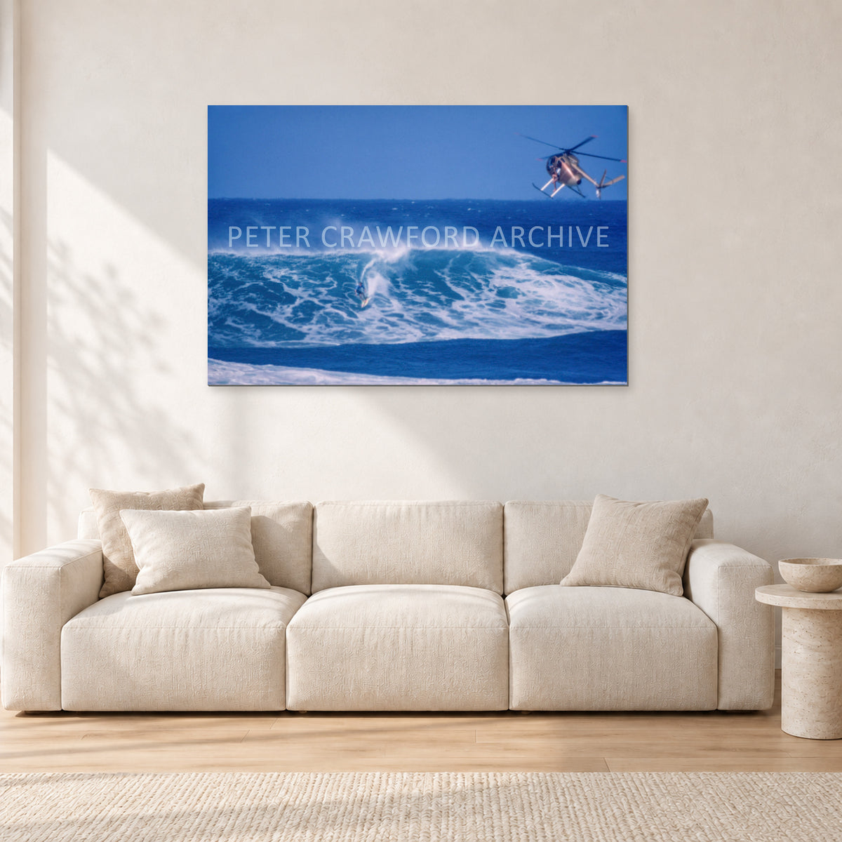 Tom Carroll, Sunset Beach Aerial by Peter Crawford — 120 × 80 cm, aluminium-mounted resin print, shown in a light minimalist living room.