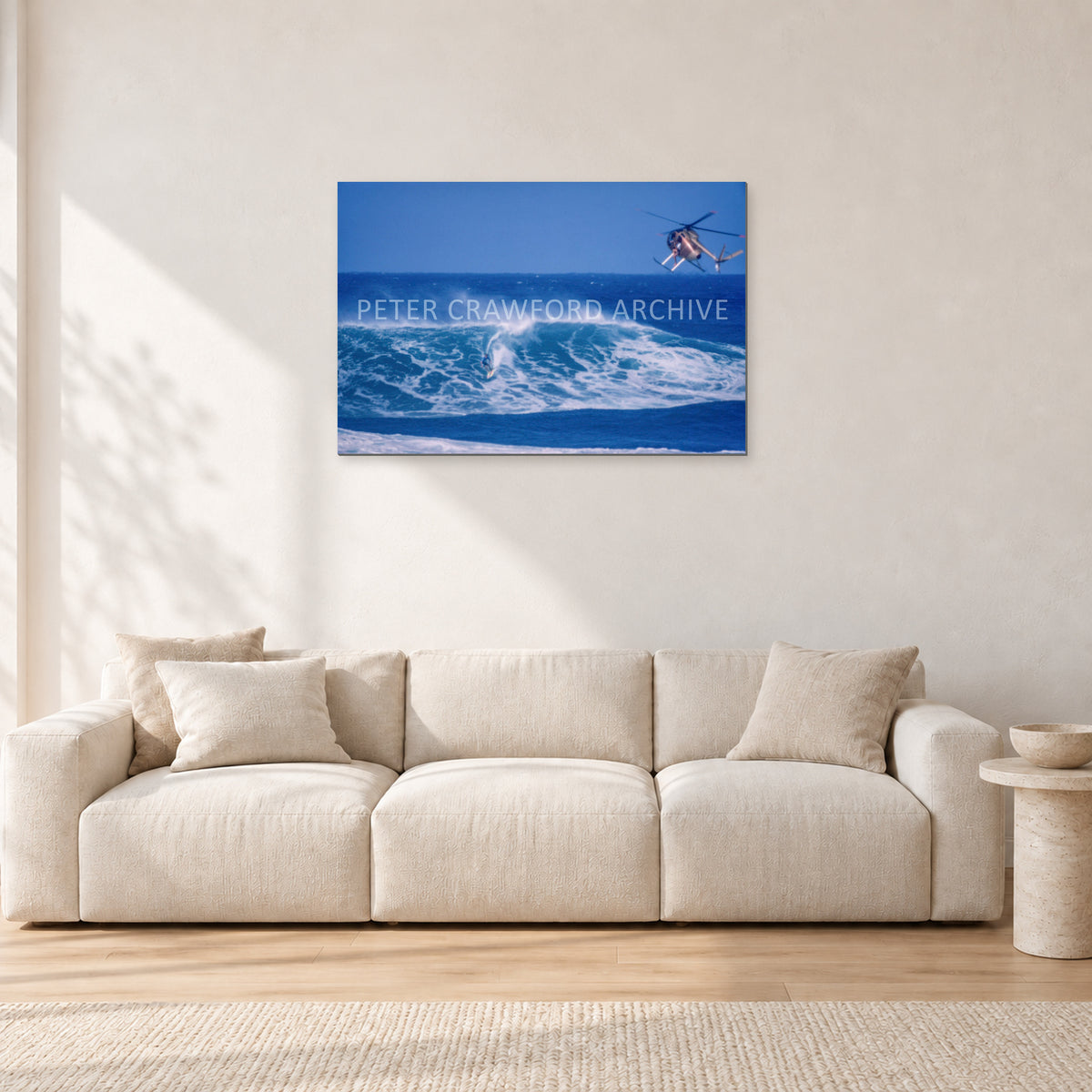 Tom Carroll, Sunset Beach Aerial by Peter Crawford — 90 × 60 cm, aluminium-mounted resin print, shown in a light minimalist living room.