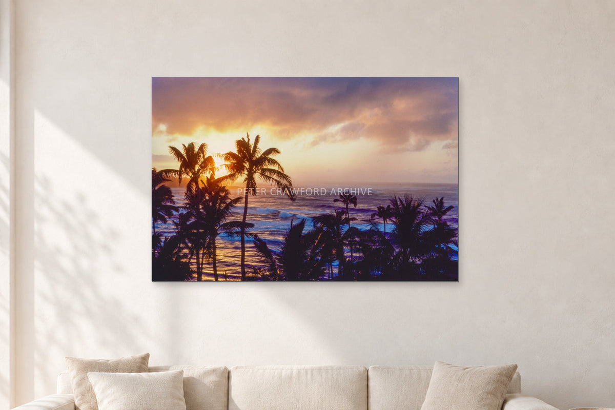 Turtle Bay Dusk by Peter Crawford — 120 × 80 cm, aluminium-mounted resin print, shown in a light minimalist living room.