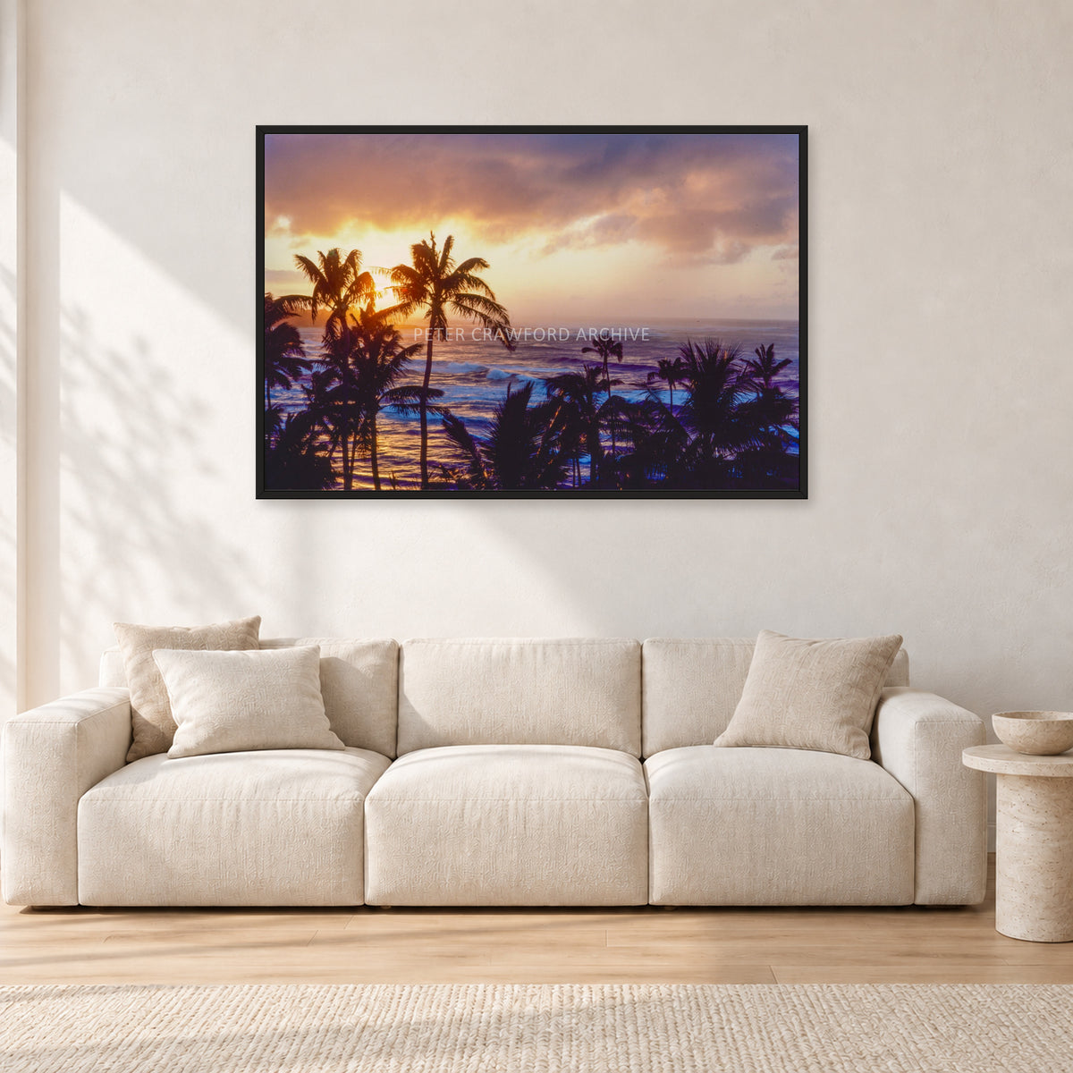 Turtle Bay Dusk by Peter Crawford — 120 × 80 cm, black frame, shown in a light minimalist living room.