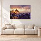 Turtle Bay Dusk by Peter Crawford — 120 × 80 cm, hayseed frame, shown in a light minimalist living room.